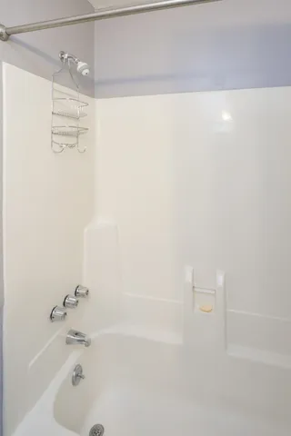 a bathroom with a bathtub