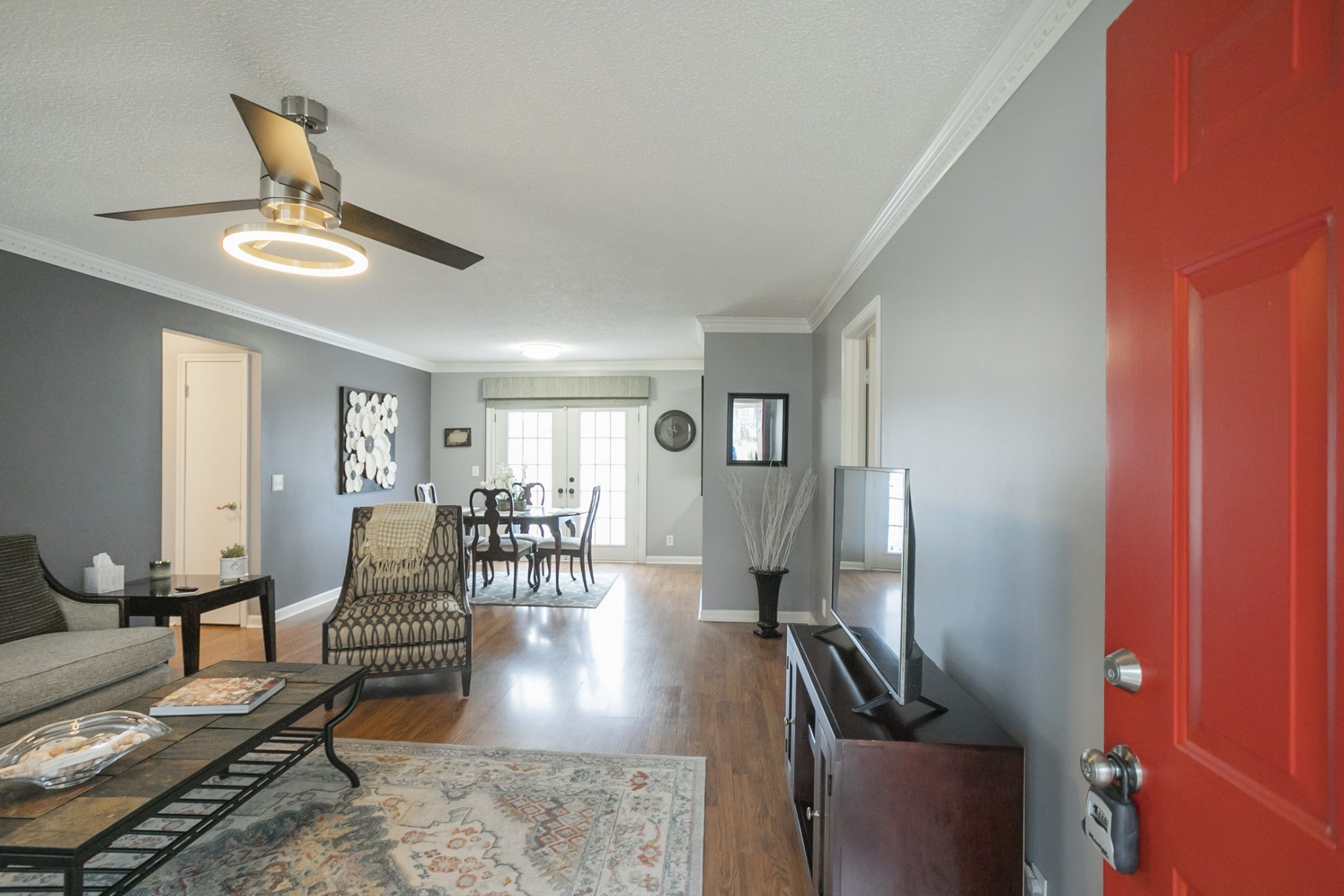 1464 Autumn Knoll Road Hermitage, TN 37076 - Photo 5 of 46 a living room with furniture and a chandelier