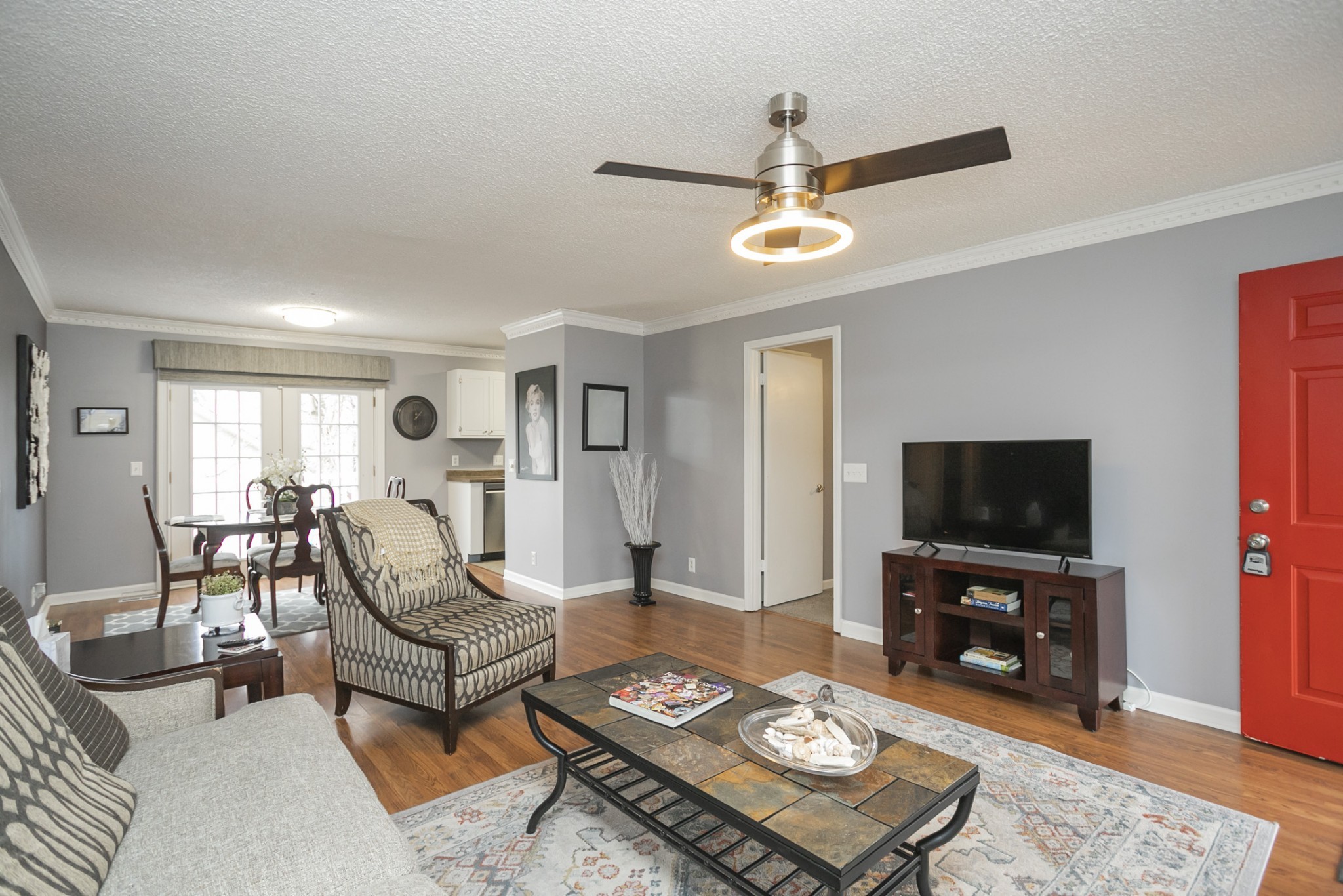 1464 Autumn Knoll Road Hermitage, TN 37076 - Photo 6 of 46 a living room with furniture and a flat screen tv