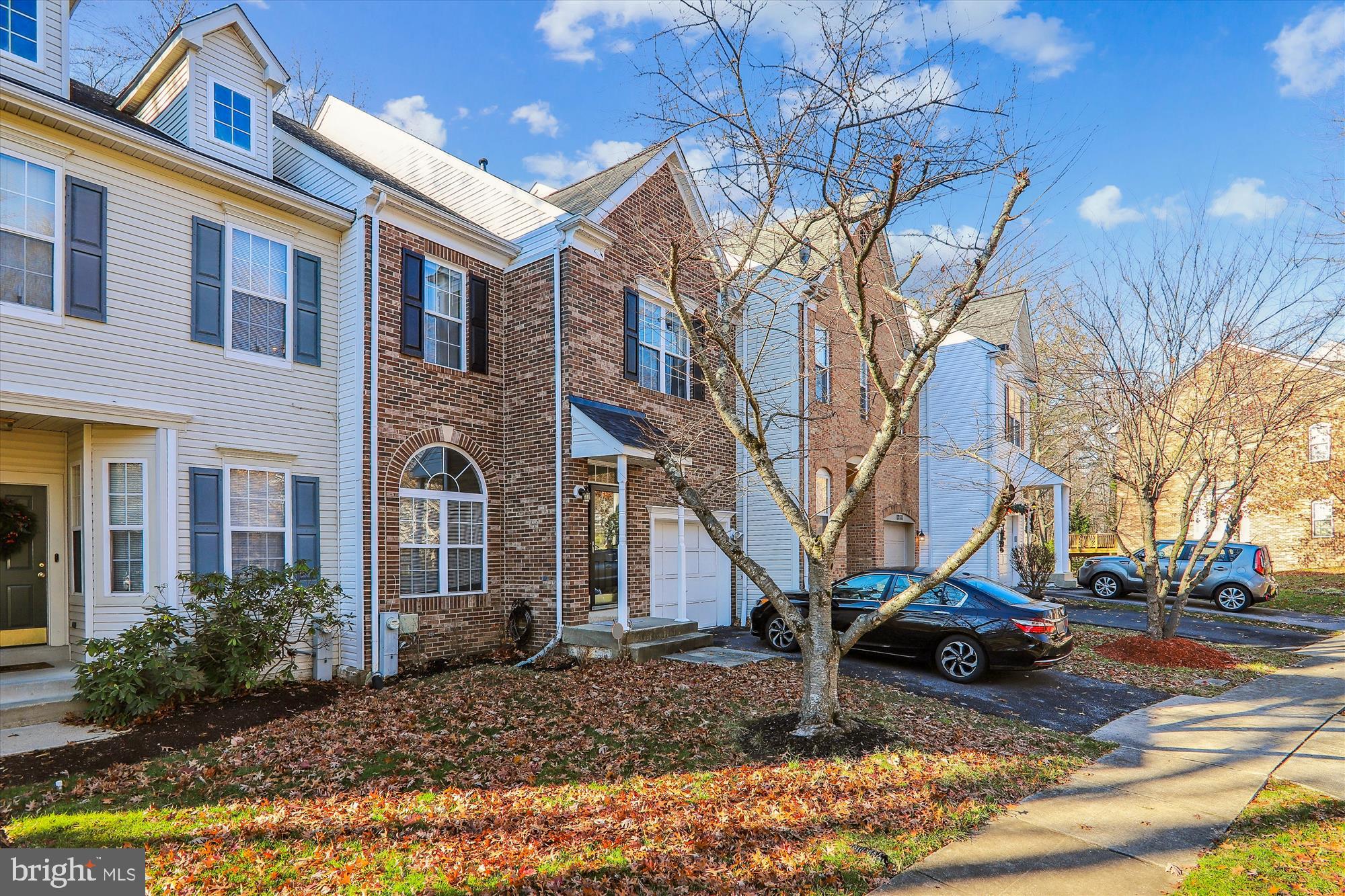 12113 Quilt Patch Lane Bowie, MD 20720 - Photo 2 of 38 a view of a house with a yard