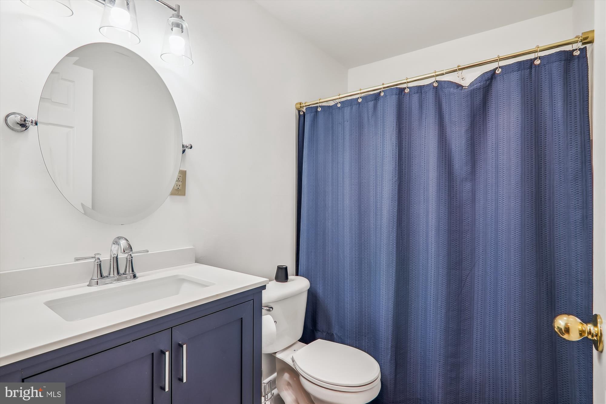 12113 Quilt Patch Lane Bowie, MD 20720 - Photo 21 of 38 a bathroom with a sink a toilet and shower