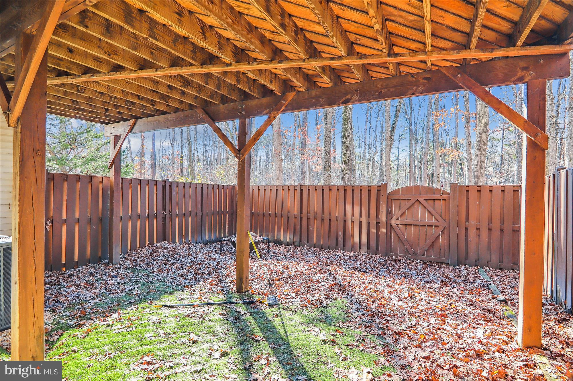 12113 Quilt Patch Lane Bowie, MD 20720 - Photo 28 of 38 a backyard of a house with a small yard