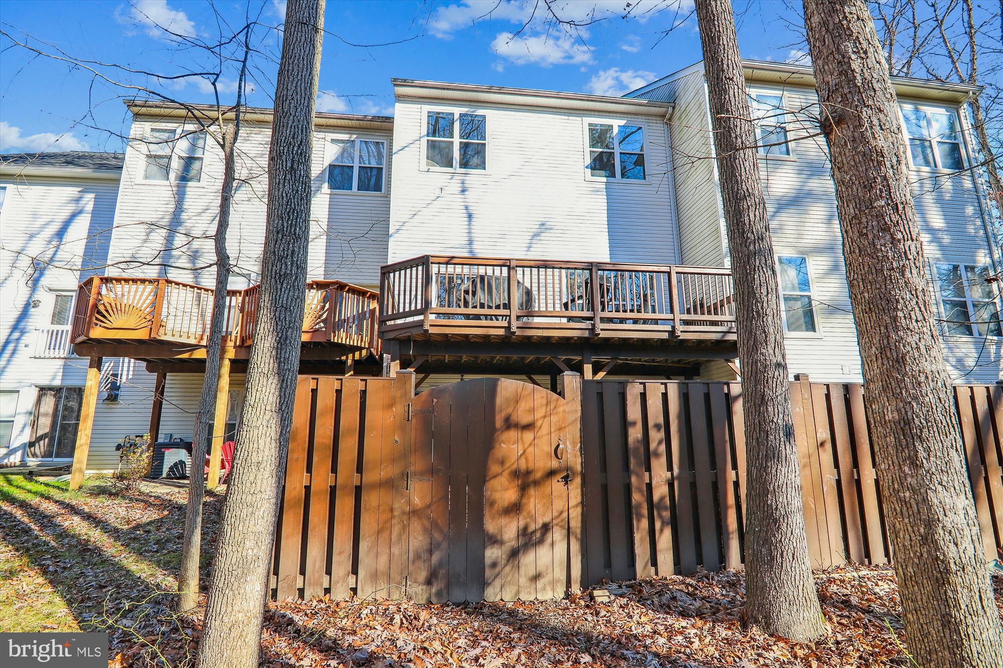 12113 Quilt Patch Lane Bowie, MD 20720 - Photo 29 of 38 a street view with tall buildings