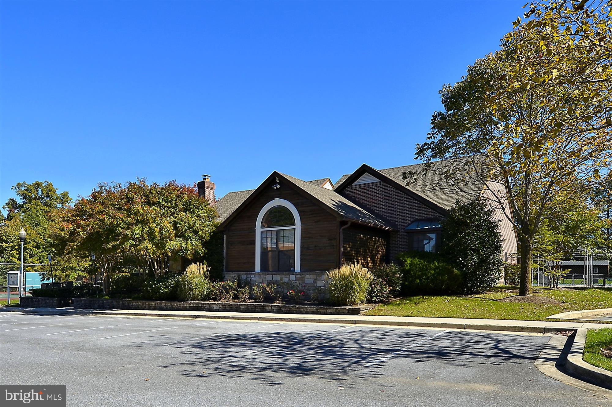 12113 Quilt Patch Lane Bowie, MD 20720 - Photo 35 of 38 a front view of a house with a yard