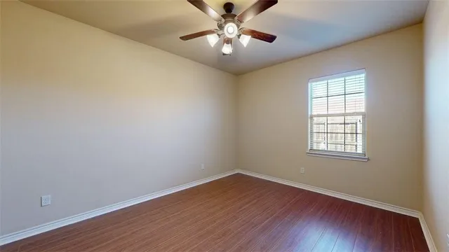 a view of staircase with wooden floor