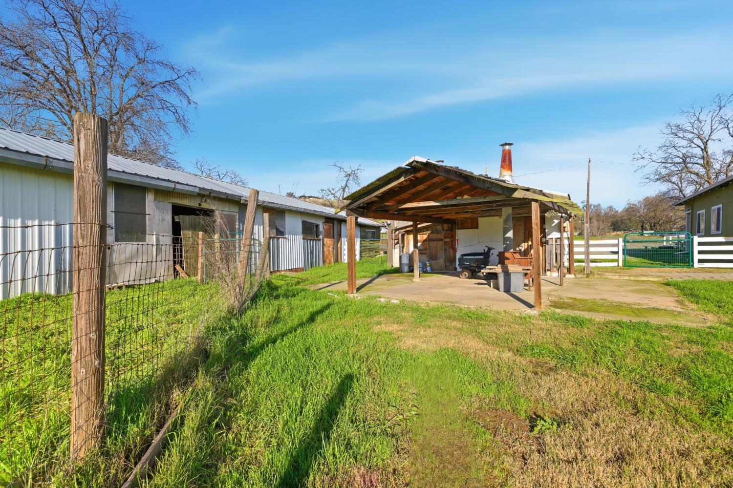 7580 Latrobe Road Shingle Springs, CA 95682 - Photo 24 of 56 a view of a house with a yard