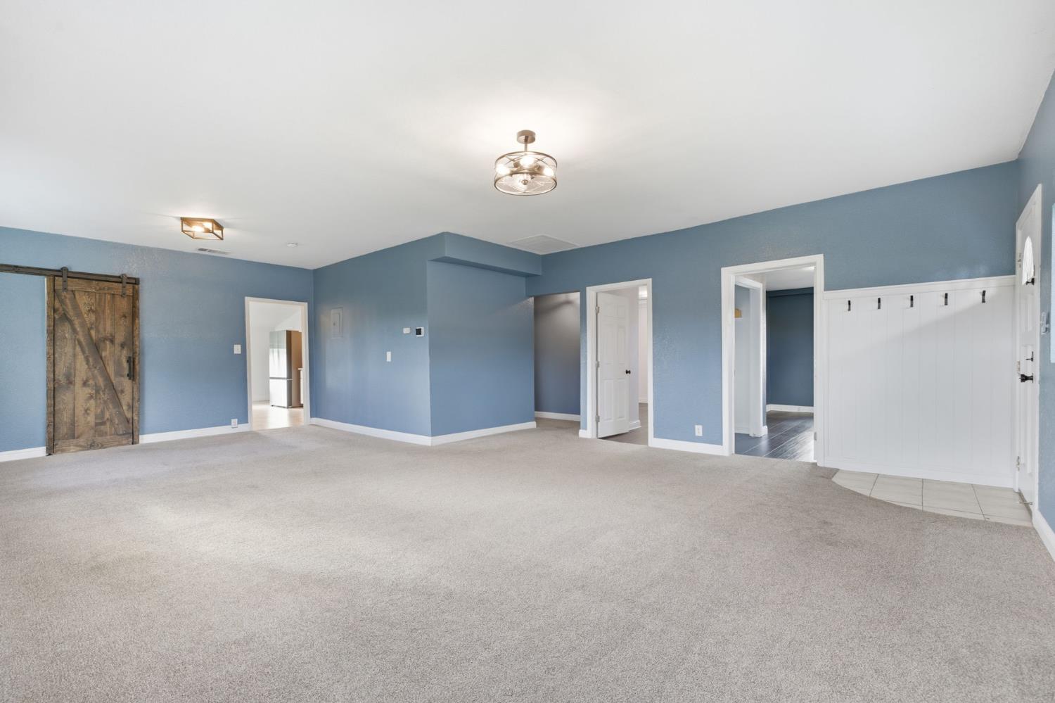 7580 Latrobe Road Shingle Springs, CA 95682 - Photo 31 of 56 a view of empty room with windows
