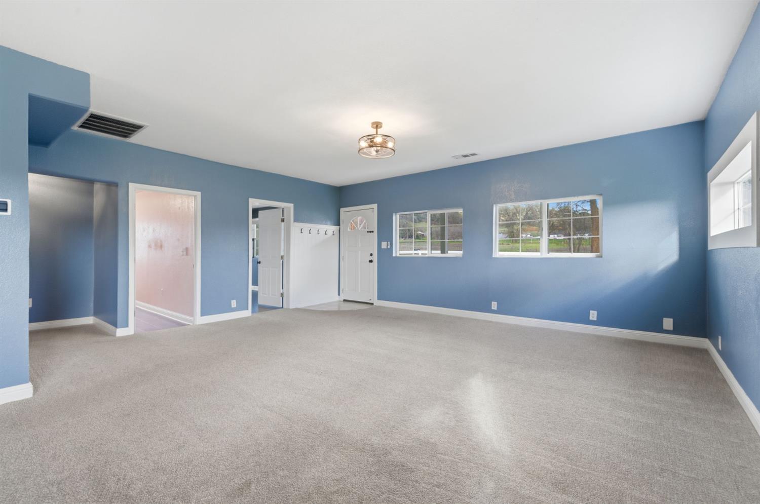7580 Latrobe Road Shingle Springs, CA 95682 - Photo 55 of 56 a view of an empty room with a window