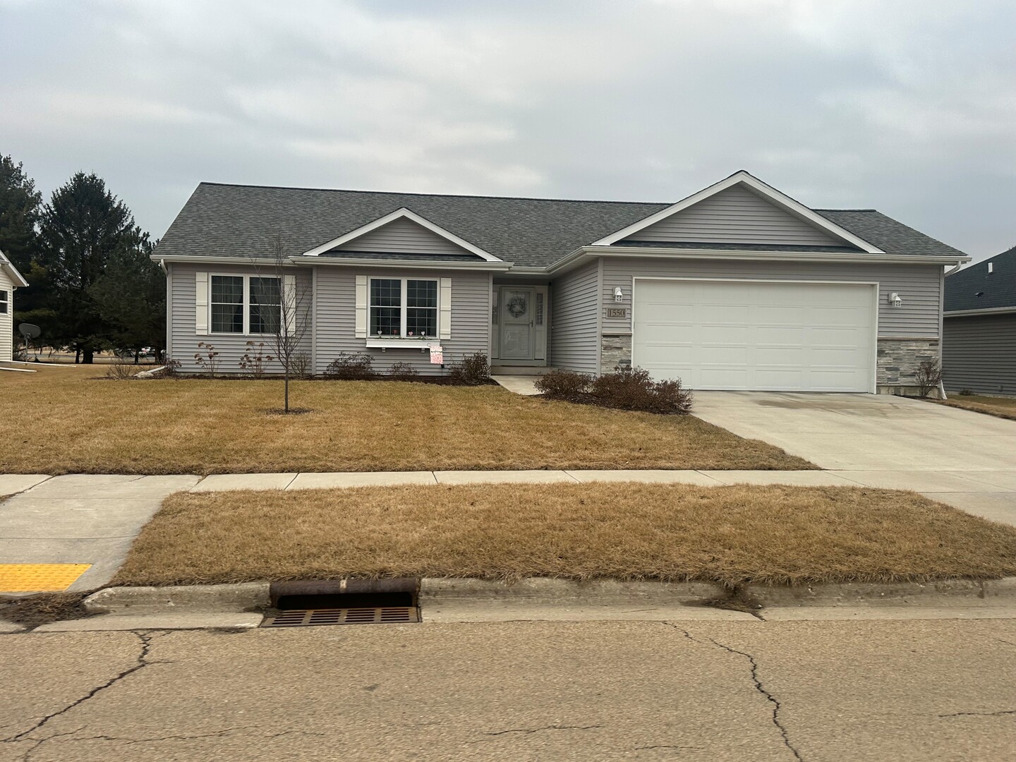 651 South Regulators Street Rochelle, IL 61068 - Photo 2 of 4 a front view of a house with a yard