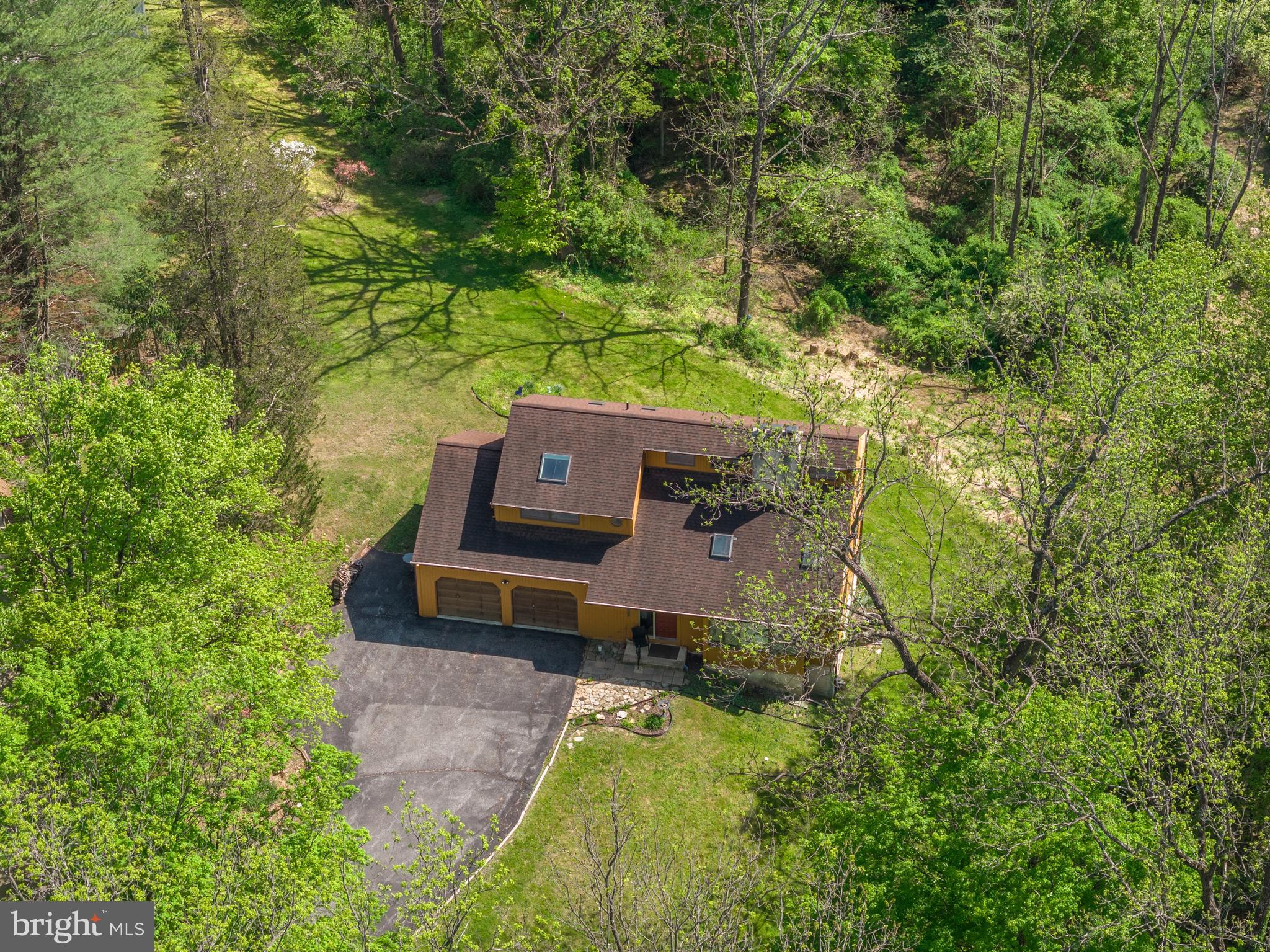 1680 East Street Road Kennett Square, PA 19348 - Photo 26 of 30 an aerial view of a house with a yard
