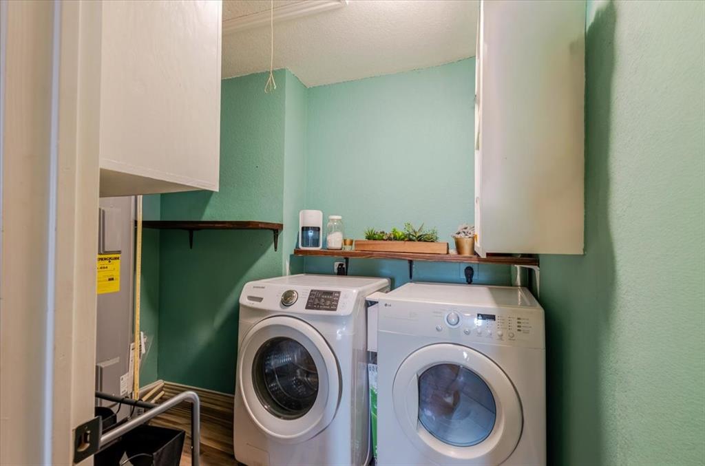 2350 Grindstone Road Millsap, TX 76066 - Photo 22 of 33 a utility room with dryer and washer