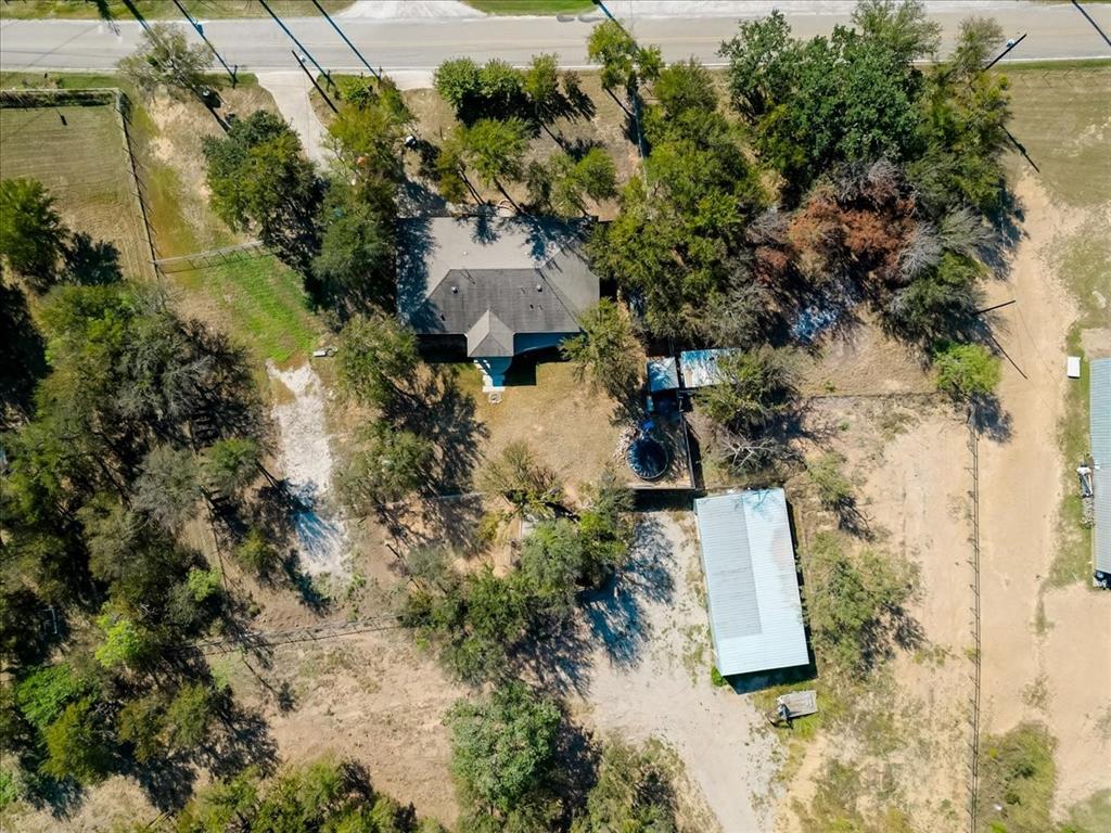 2350 Grindstone Road Millsap, TX 76066 - Photo 31 of 33 an aerial view of residential house with outdoor space
