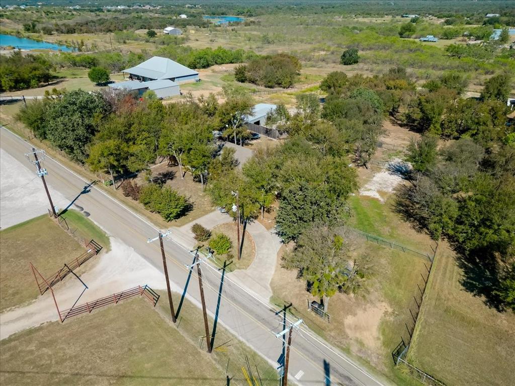 2350 Grindstone Road Millsap, TX 76066 - Photo 32 of 33 a view of a lake with a yard