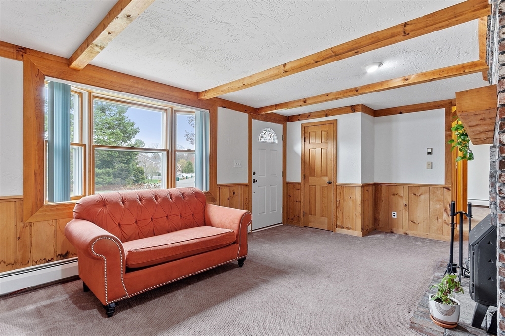 40 Elizabeth Road Billerica, MA 01821 - Photo 13 of 42 a living room with furniture and a window