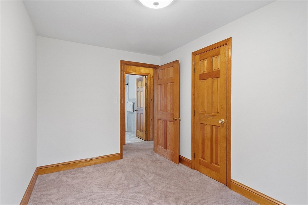 40 Elizabeth Road Billerica, MA 01821 - Photo 18 of 42 a view of an empty room and closet area