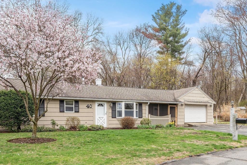 40 Elizabeth Road Billerica, MA 01821 - Photo 38 of 42 a front view of a house with a yard and trees