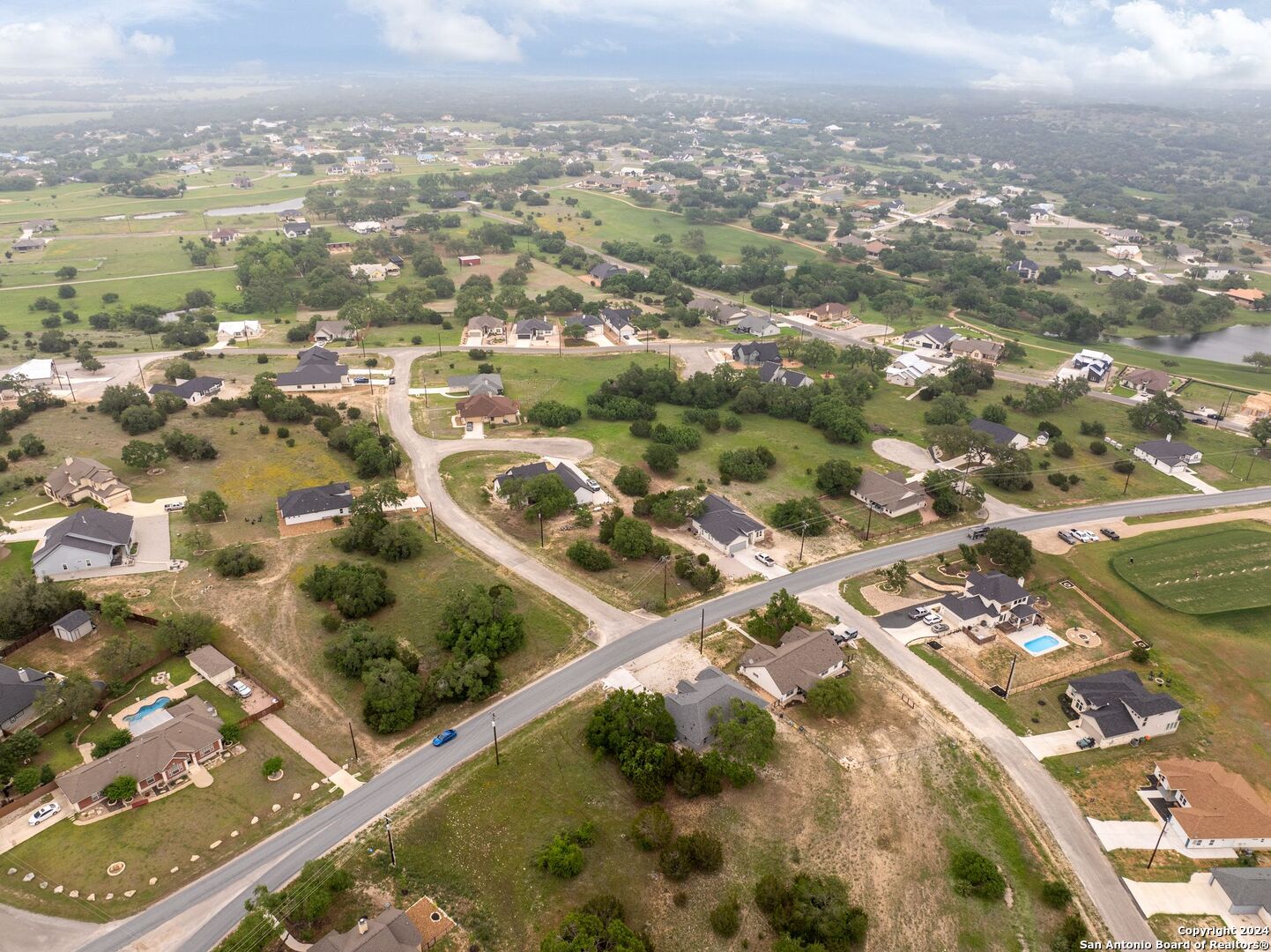 449 South Calvin Barrett Blanco, TX 78606 - Photo 13 of 23 an aerial view of residential houses with outdoor space