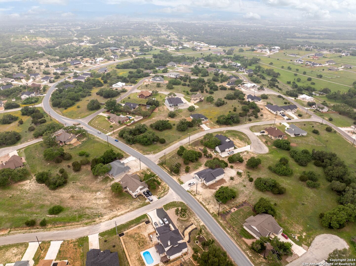 449 South Calvin Barrett Blanco, TX 78606 - Photo 14 of 23 an aerial view of residential houses with outdoor space