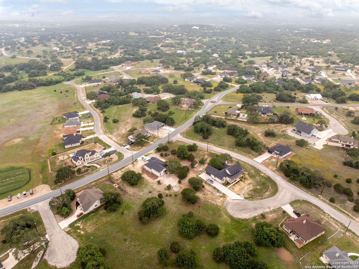 449 South Calvin Barrett Blanco, TX 78606 - Photo 15 of 23 an aerial view of residential building with parking space