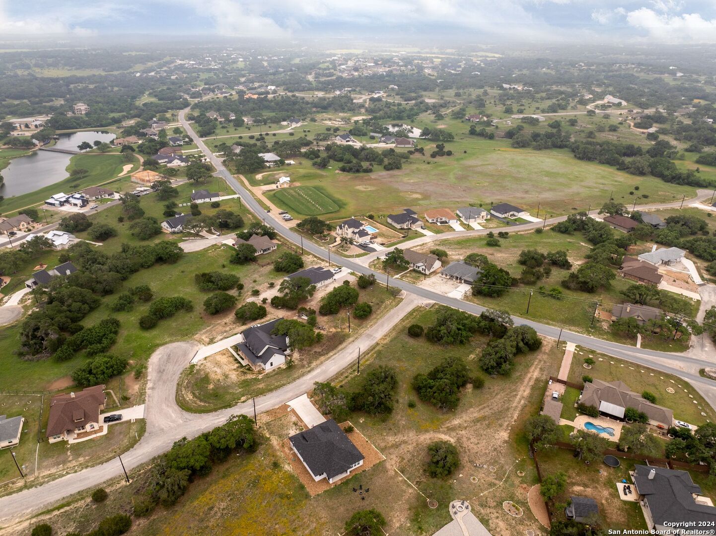 449 South Calvin Barrett Blanco, TX 78606 - Photo 16 of 23 an aerial view of residential houses with outdoor space