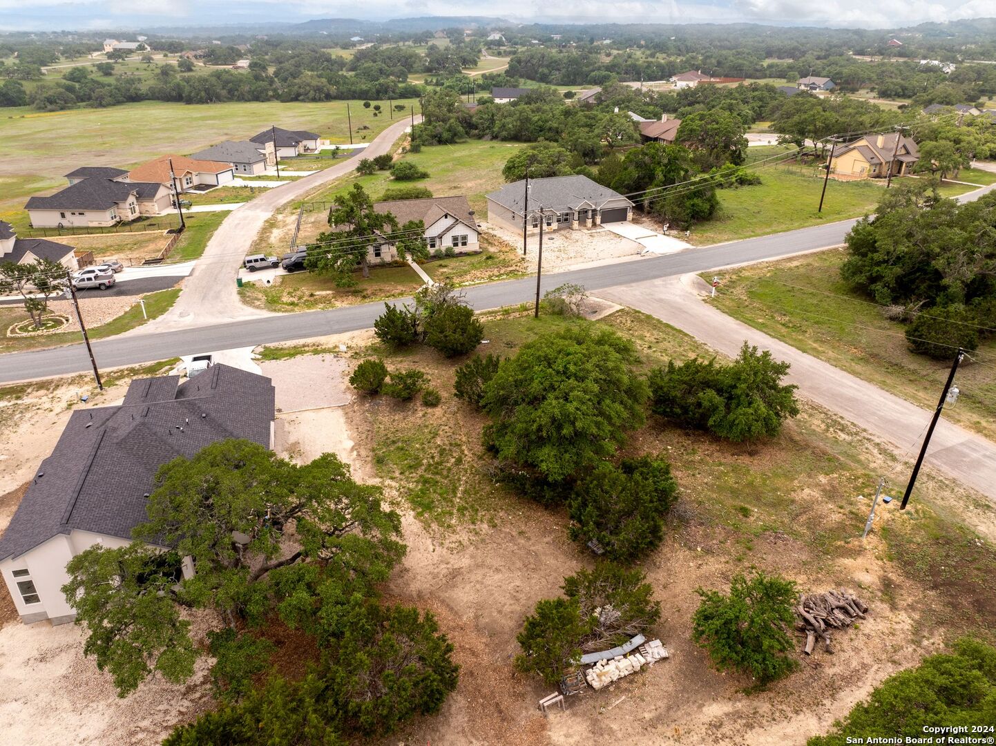 449 South Calvin Barrett Blanco, TX 78606 - Photo 5 of 23 a view of a lake with a mountain