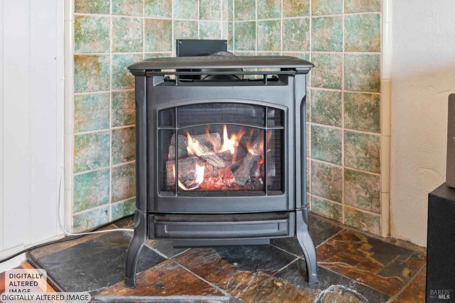 6960 Round Oak Road Penngrove, CA 94951 - Photo 40 of 58 a stove top oven sitting inside of a kitchen