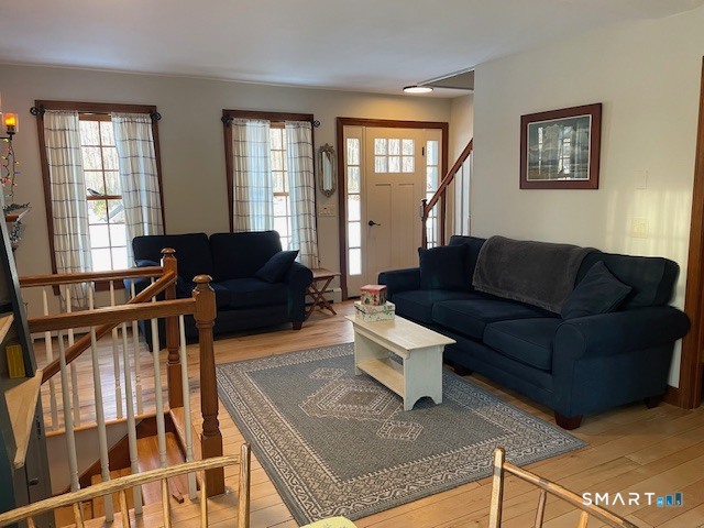 415 Kent Hollow Road Kent, CT 06785 - Photo 2 of 10 a living room with furniture and a window