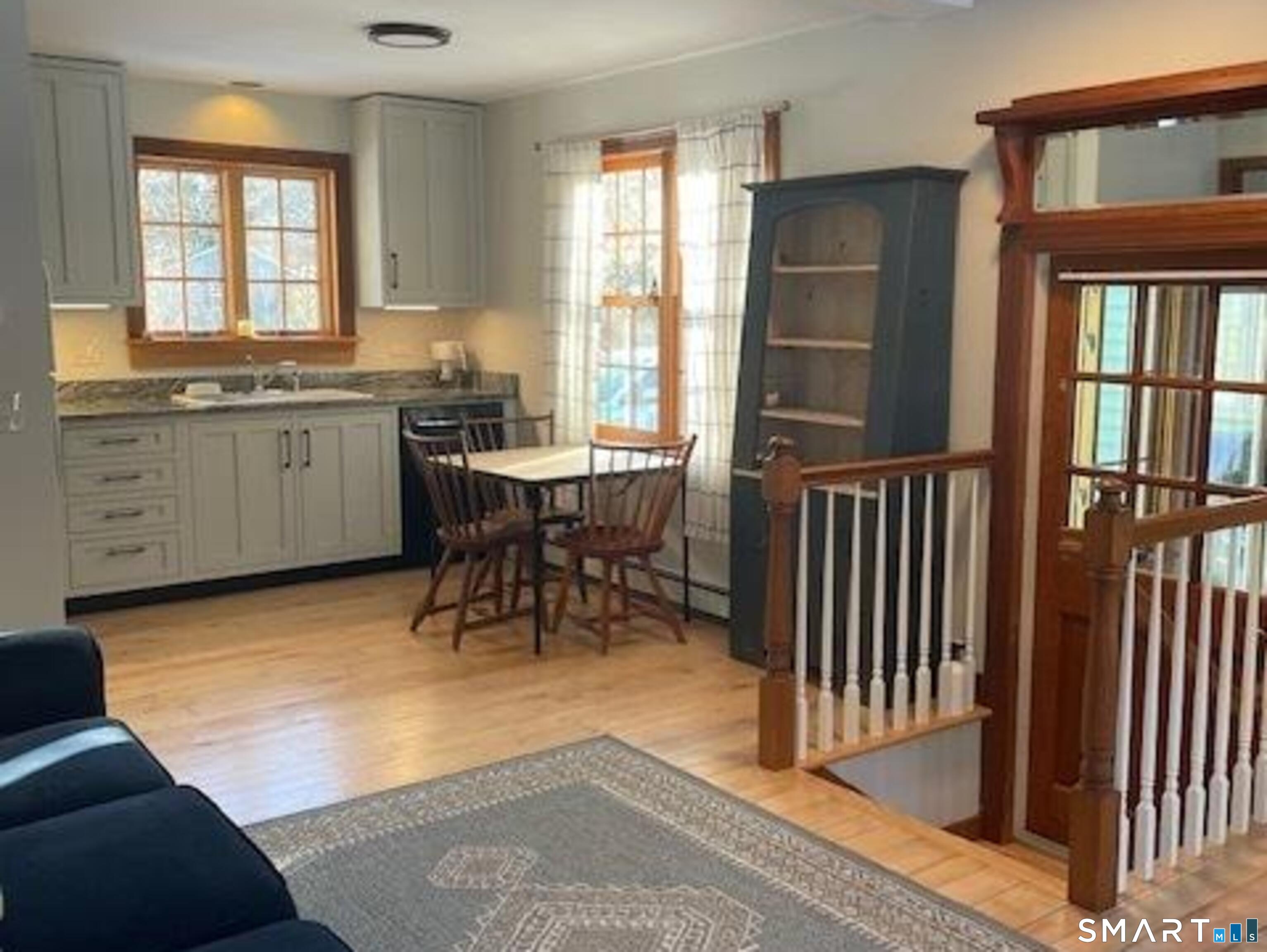 415 Kent Hollow Road Kent, CT 06785 - Photo 4 of 10 a view of a kitchen from the kitchen and dining room