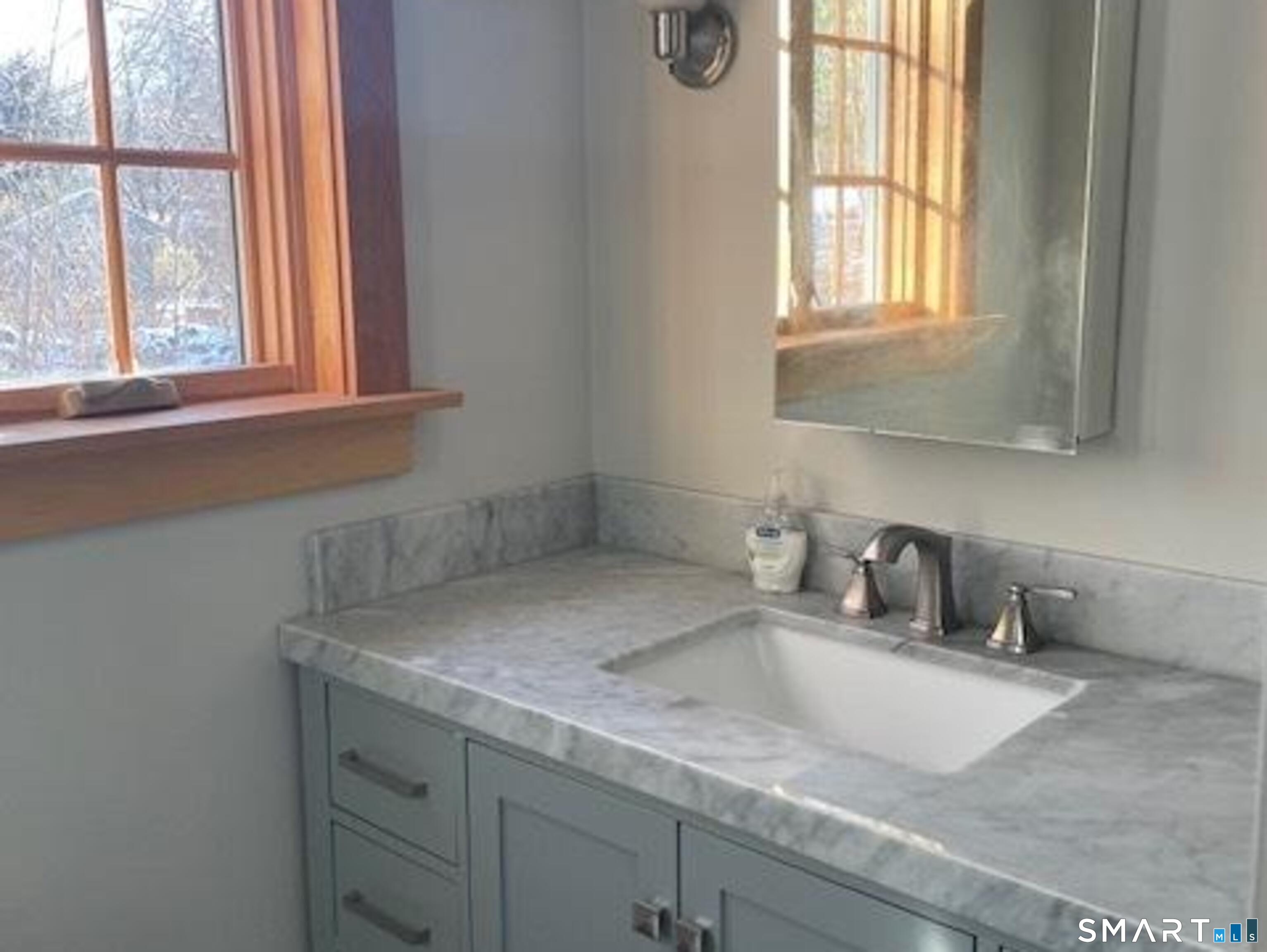 415 Kent Hollow Road Kent, CT 06785 - Photo 8 of 10 a kitchen with a sink cabinets and window