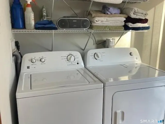 a utility room with dryer and washer