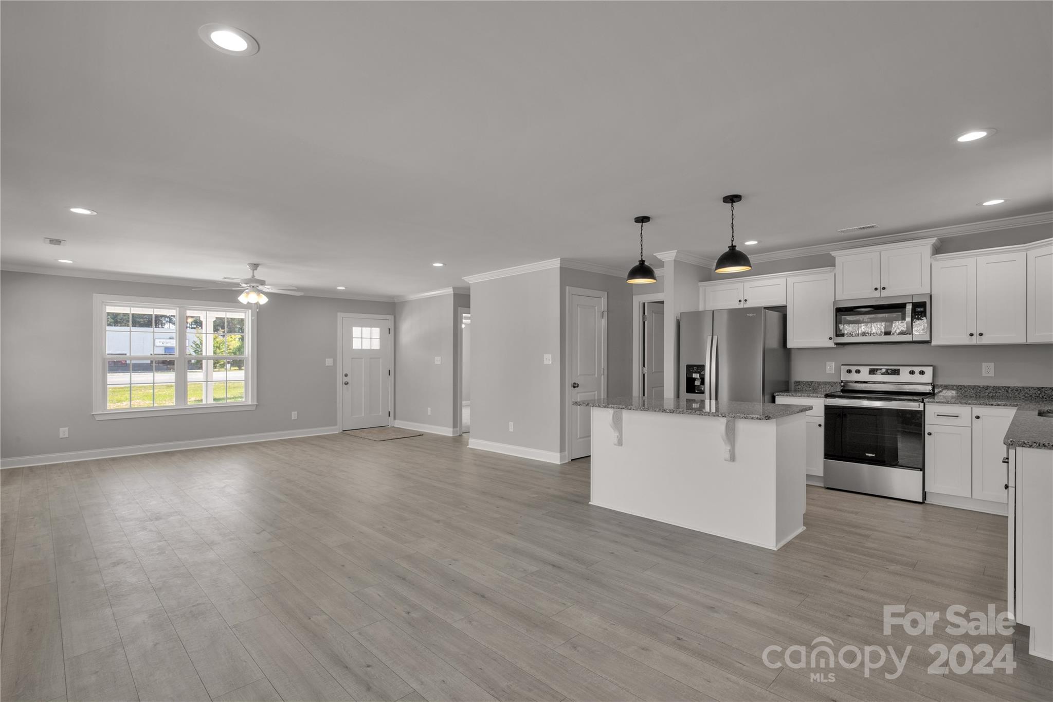 1780 Airport Road Lancaster, SC 29720 - Photo 12 of 26 a view of kitchen with wooden floor and electronic appliances