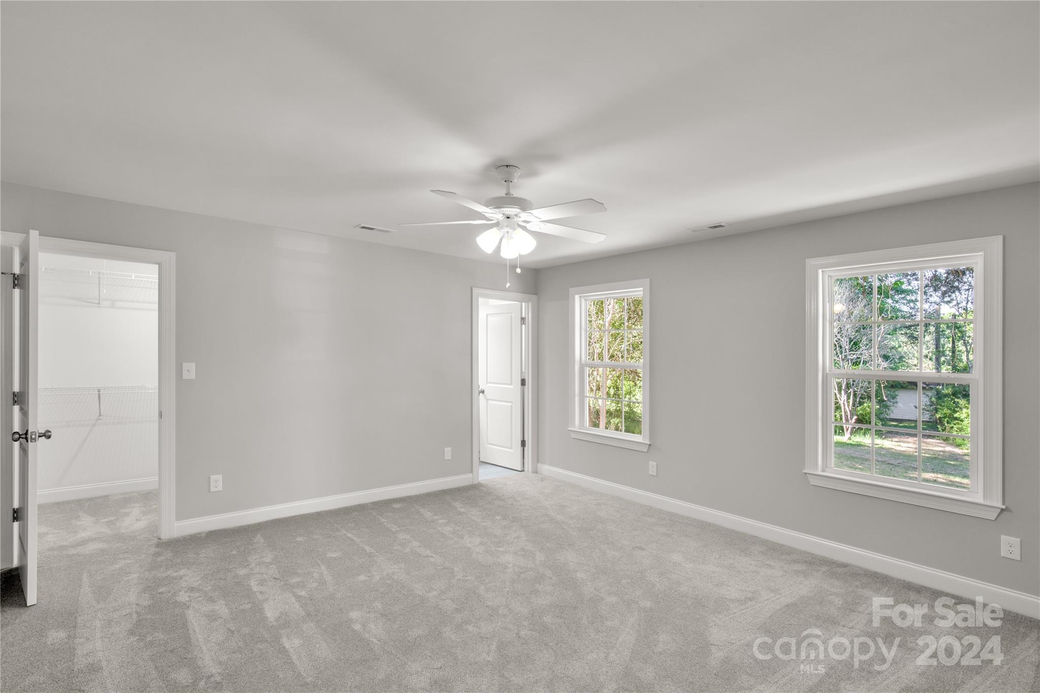 1780 Airport Road Lancaster, SC 29720 - Photo 15 of 26 a view of a livingroom with a ceiling fan and window