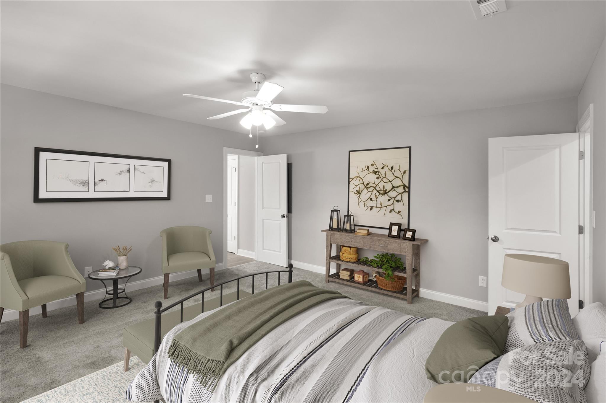 1780 Airport Road Lancaster, SC 29720 - Photo 25 of 26 a bedroom with a bed and a chandelier