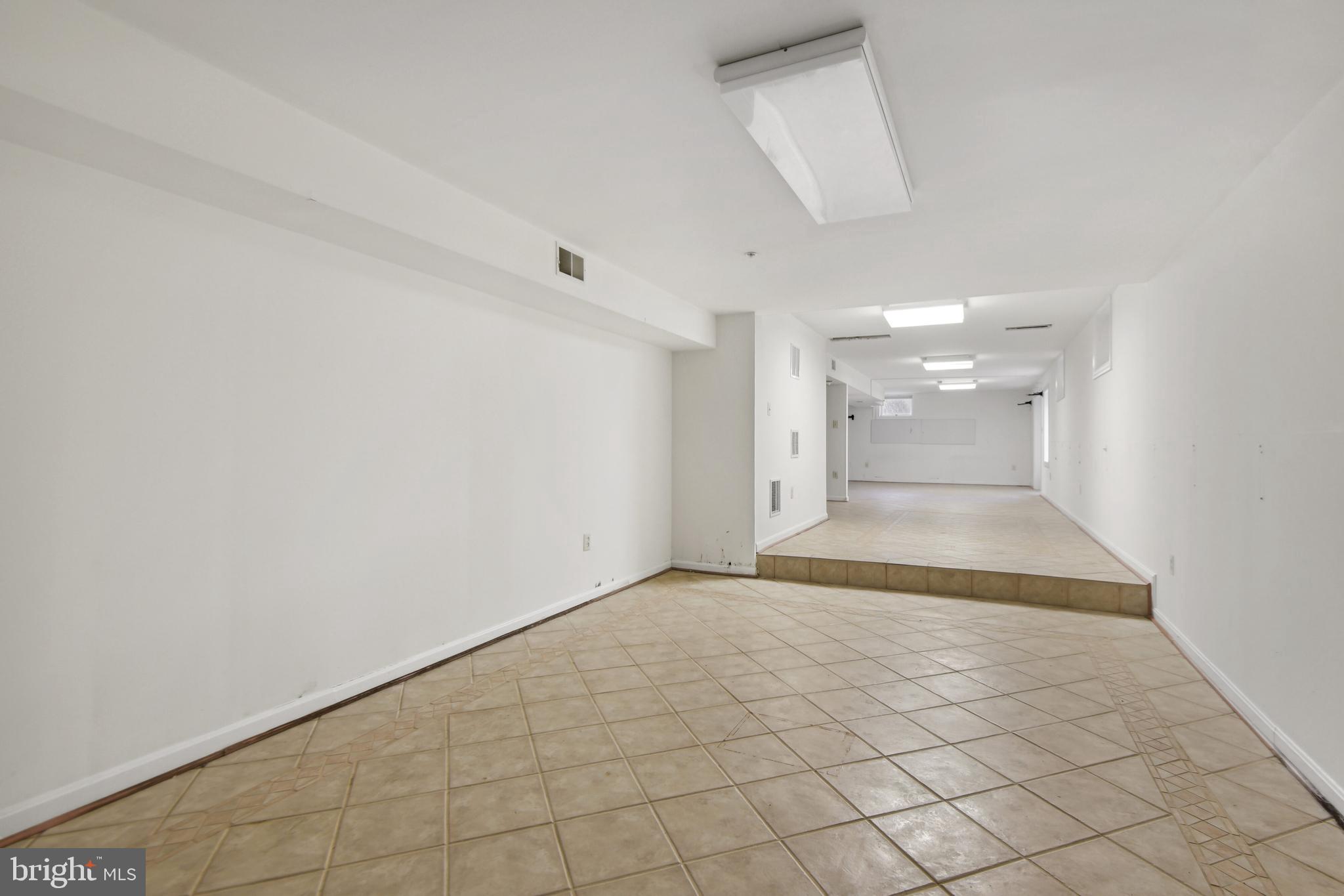 18102 Glover Court Accokeek, MD 20607 - Photo 54 of 68 Lower Level Rec Room