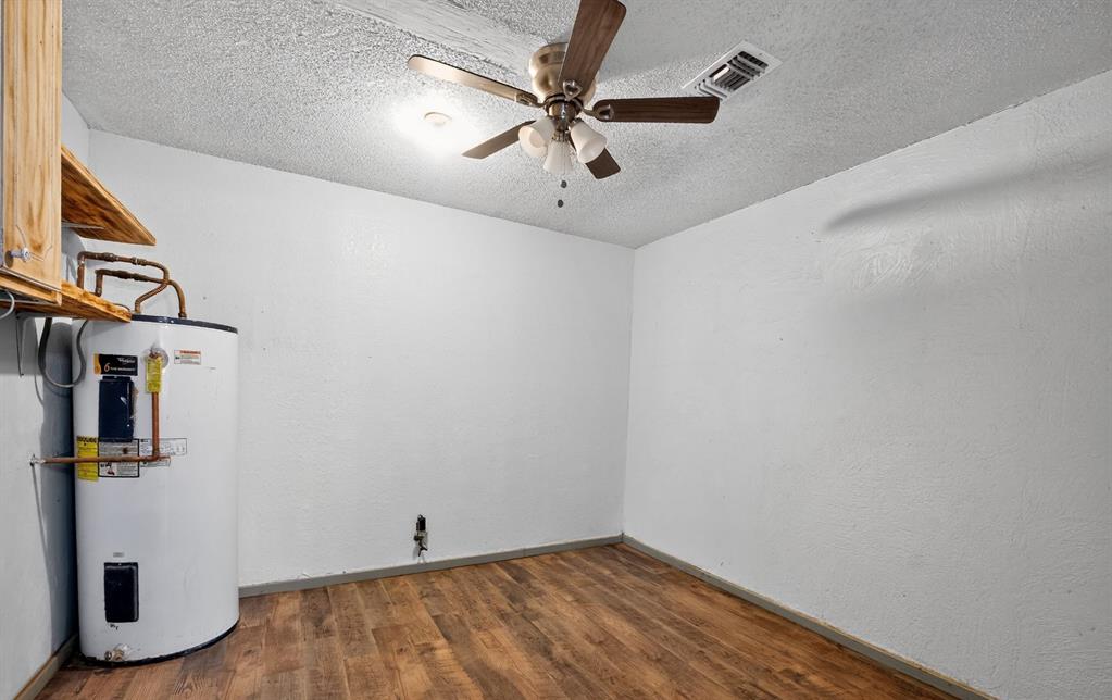604 Fegan Street Weatherford, TX 76086 - Photo 28 of 36 a view of an entryway with wooden floor