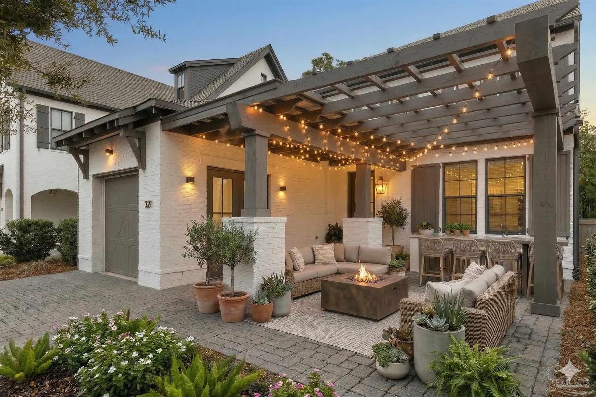 321 Ridgewalk Circle Santa Rosa Beach, FL 32459 - Photo 1 of 42 a building outdoor space with patio furniture and potted plants