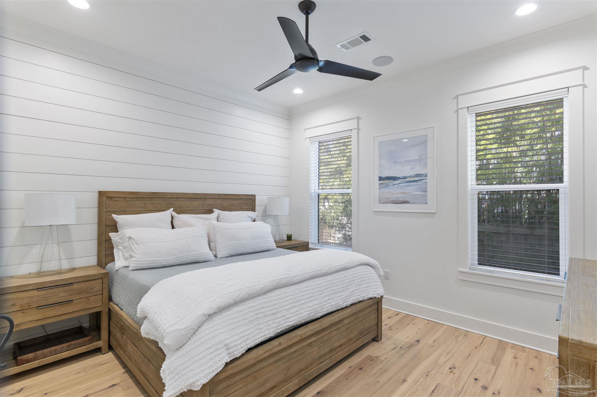 321 Ridgewalk Circle Santa Rosa Beach, FL 32459 - Photo 17 of 42 a bedroom with a large bed and a window