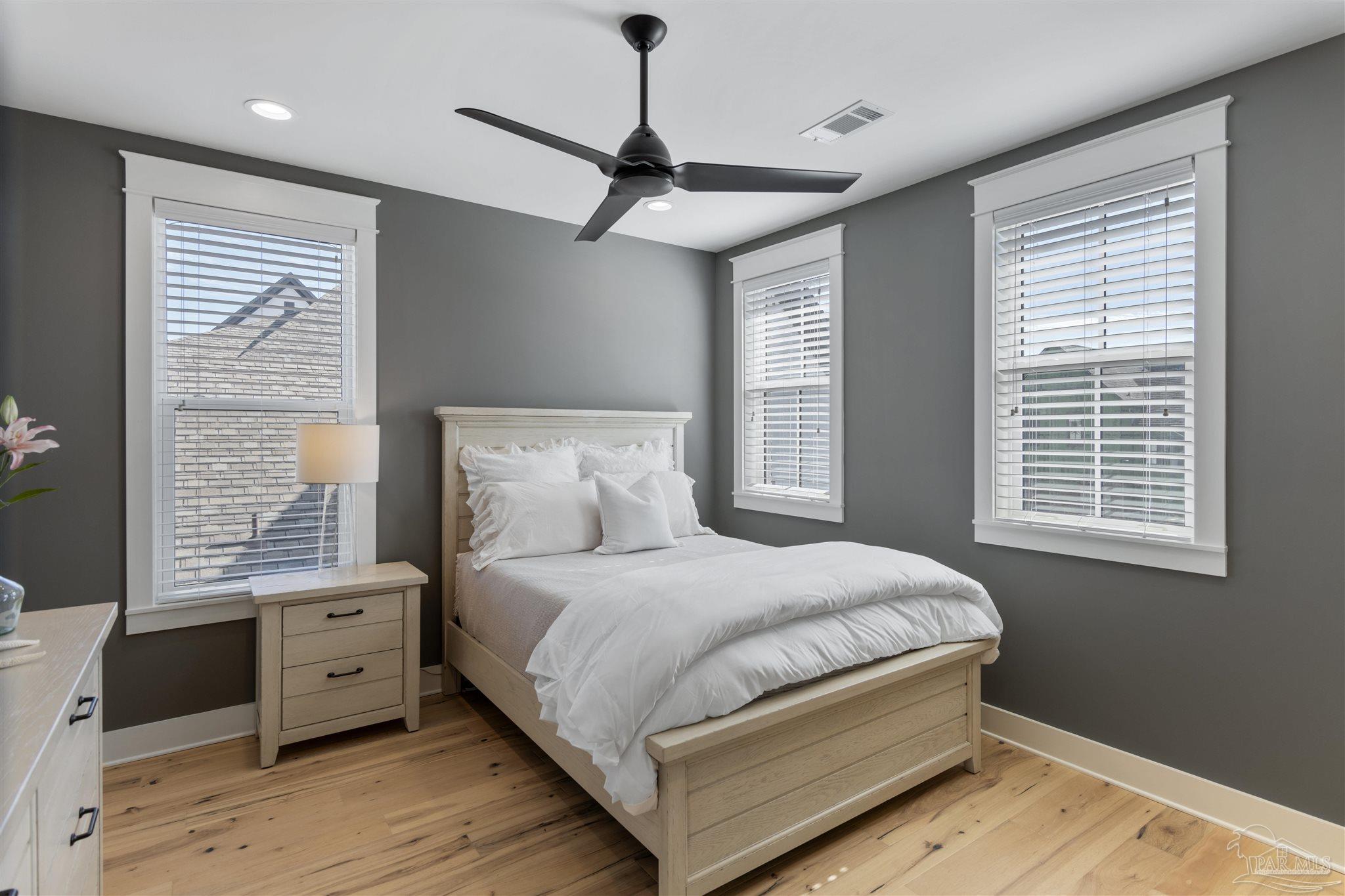 321 Ridgewalk Circle Santa Rosa Beach, FL 32459 - Photo 27 of 42 a bedroom with a large bed and a window