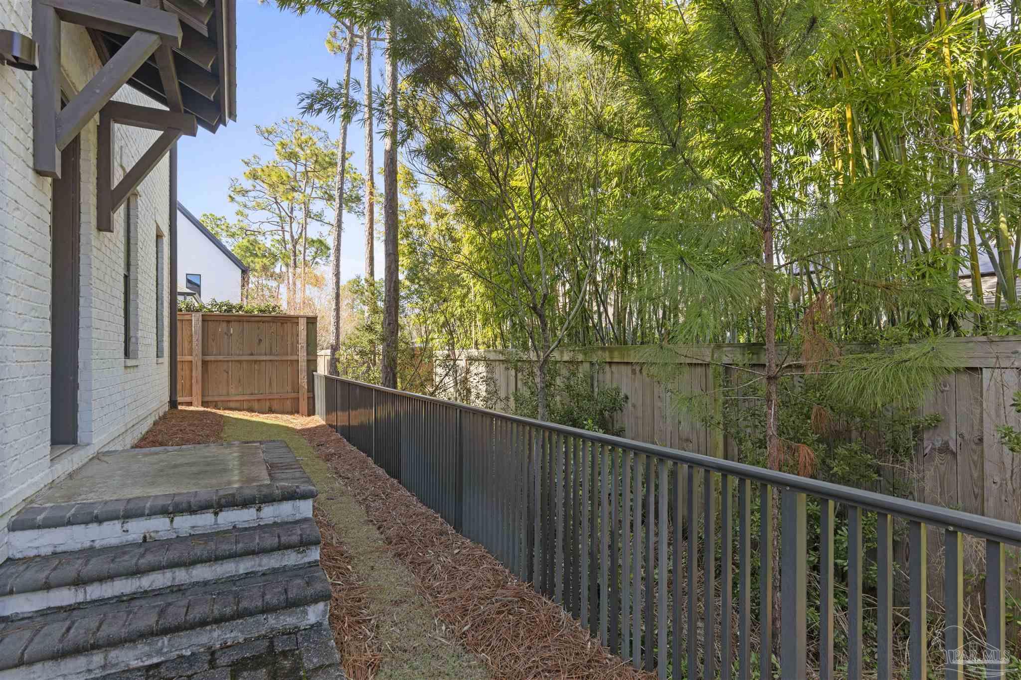 321 Ridgewalk Circle Santa Rosa Beach, FL 32459 - Photo 34 of 42 a house view with a garden space