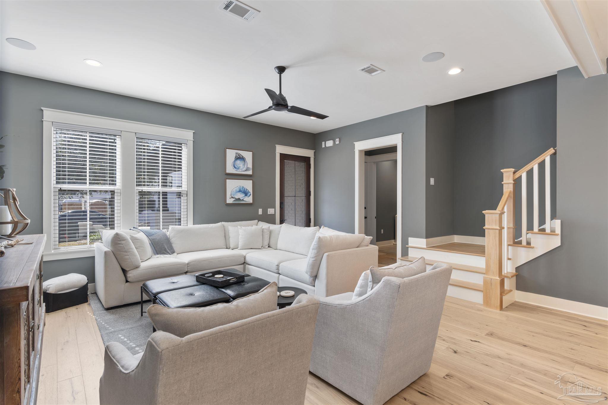 321 Ridgewalk Circle Santa Rosa Beach, FL 32459 - Photo 8 of 42 a living room with furniture and a large window