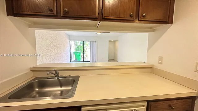 a bathroom with a sink and mirror