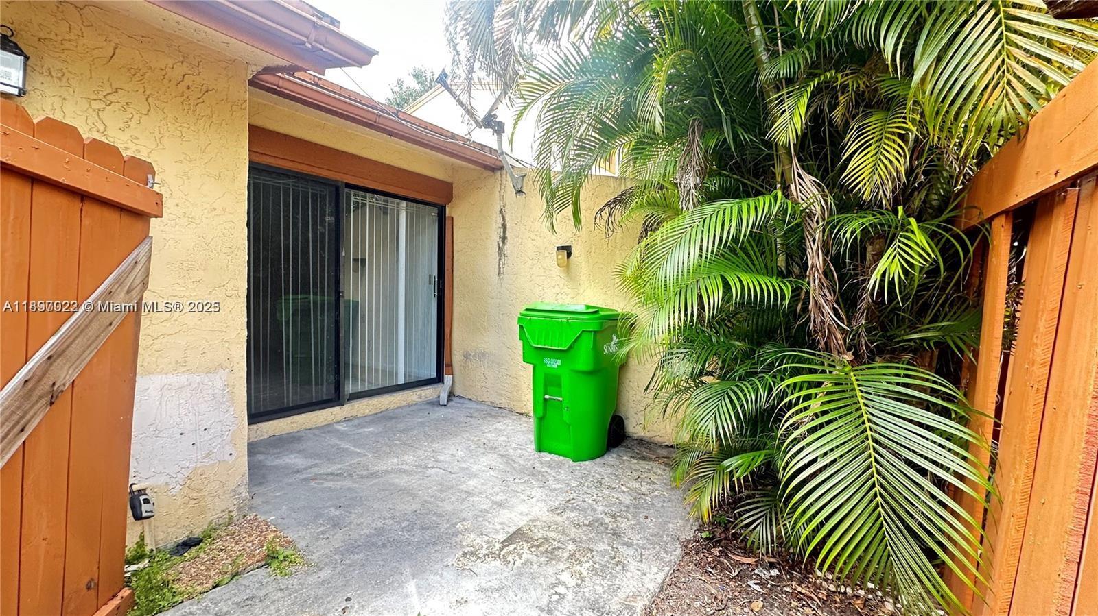 4091 Sierra Terrace, Unit 4091 Sunrise, FL 33351 - Photo 13 of 24 a view of outdoor space and yard