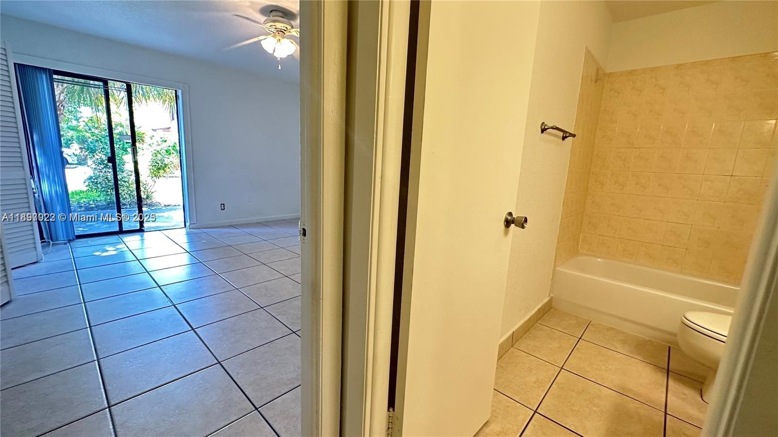 4091 Sierra Terrace, Unit 4091 Sunrise, FL 33351 - Photo 10 of 24 a view of a bathroom with a shower