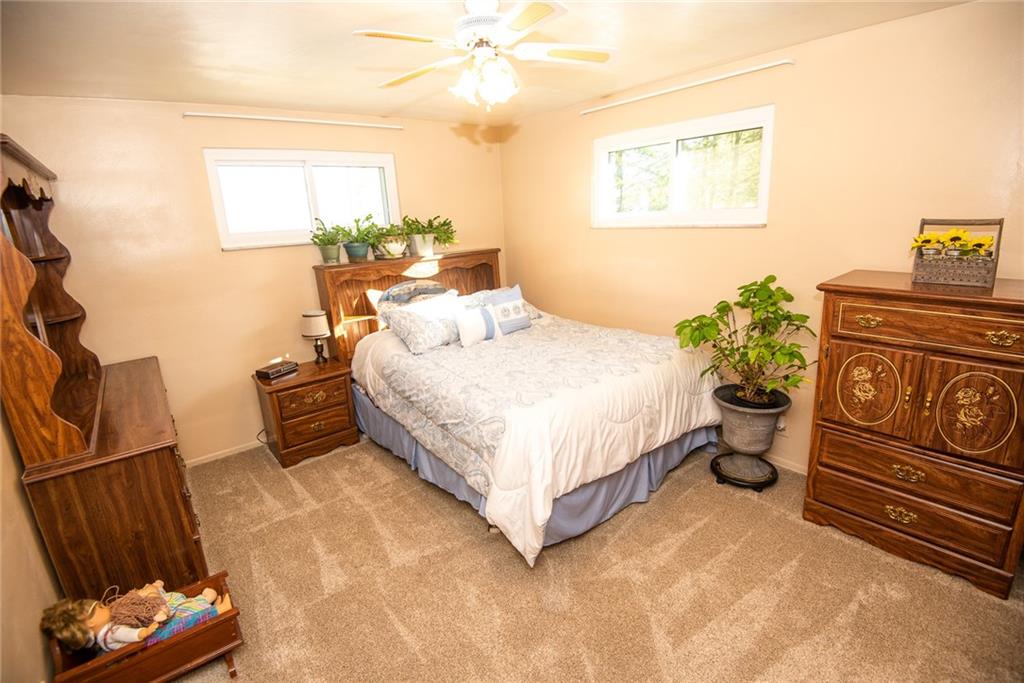 47 Grubbs Road Cheswick, PA 15024 - Photo 13 of 22 a bedroom with a bed and a couch