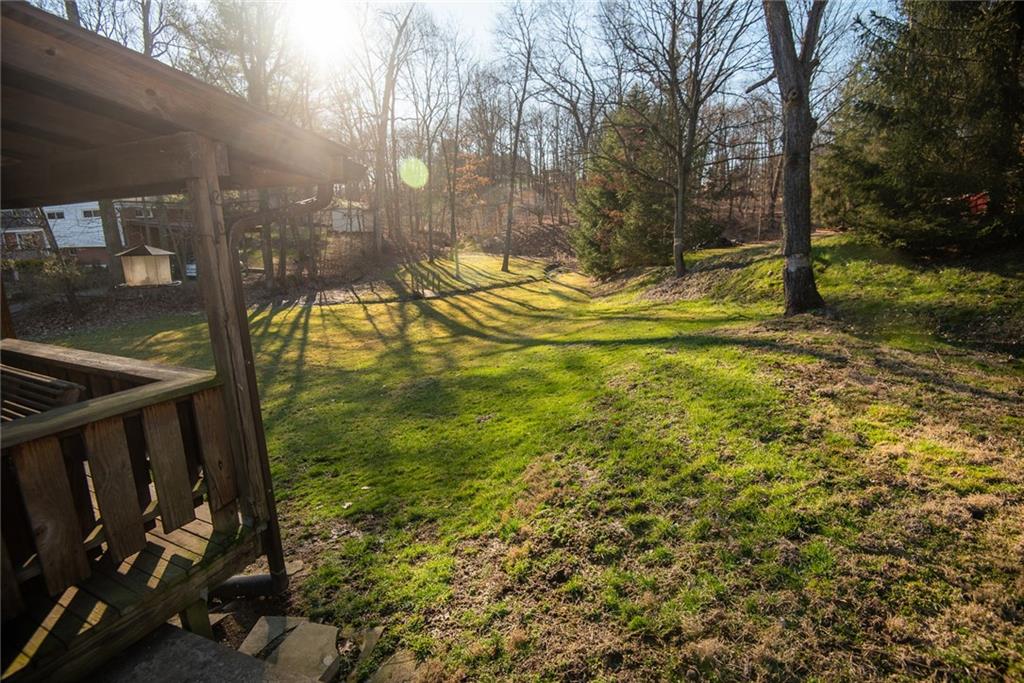 47 Grubbs Road Cheswick, PA 15024 - Photo 20 of 22 a view of swimming pool from a garden