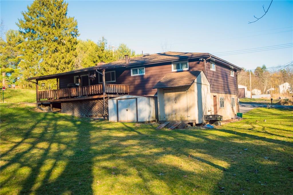 47 Grubbs Road Cheswick, PA 15024 - Photo 22 of 22 a view of a big house with a big yard and large trees