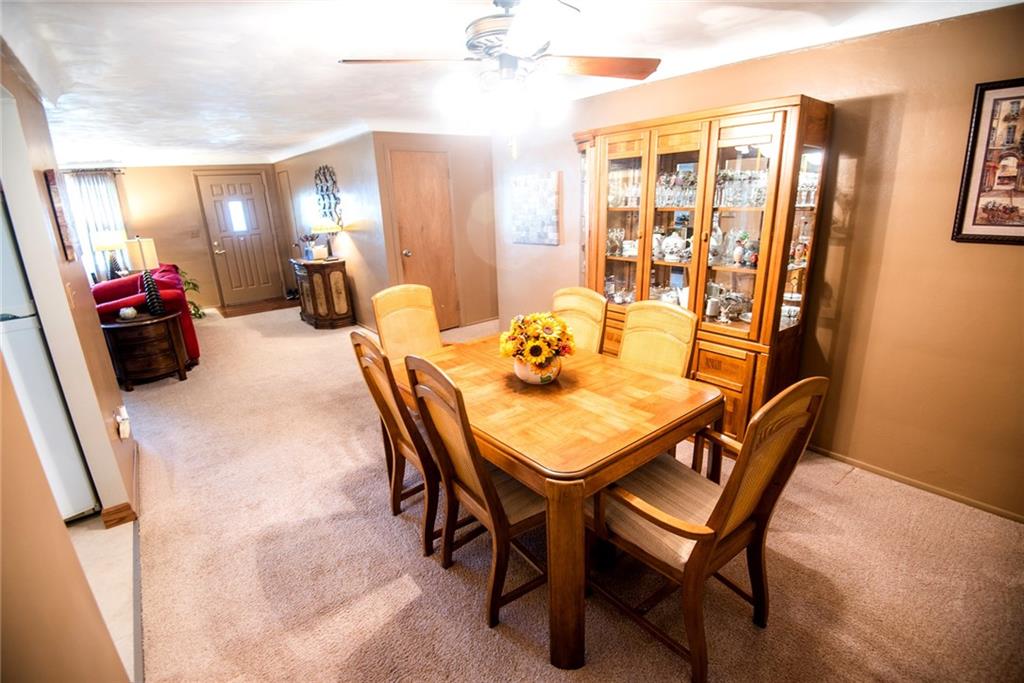 47 Grubbs Road Cheswick, PA 15024 - Photo 5 of 22 a view of a dining room with furniture and a chandelier