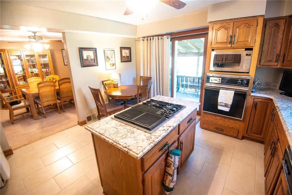 47 Grubbs Road Cheswick, PA 15024 - Photo 8 of 22 a living room with furniture and a fireplace