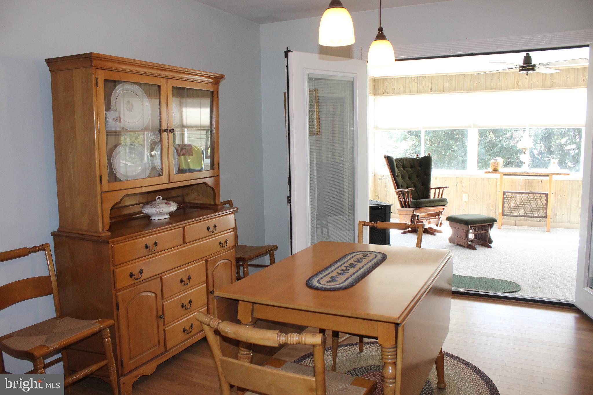 328 Longmeadow Road Lancaster, PA 17601 - Photo 14 of 38 Dining Area into Sun Room
