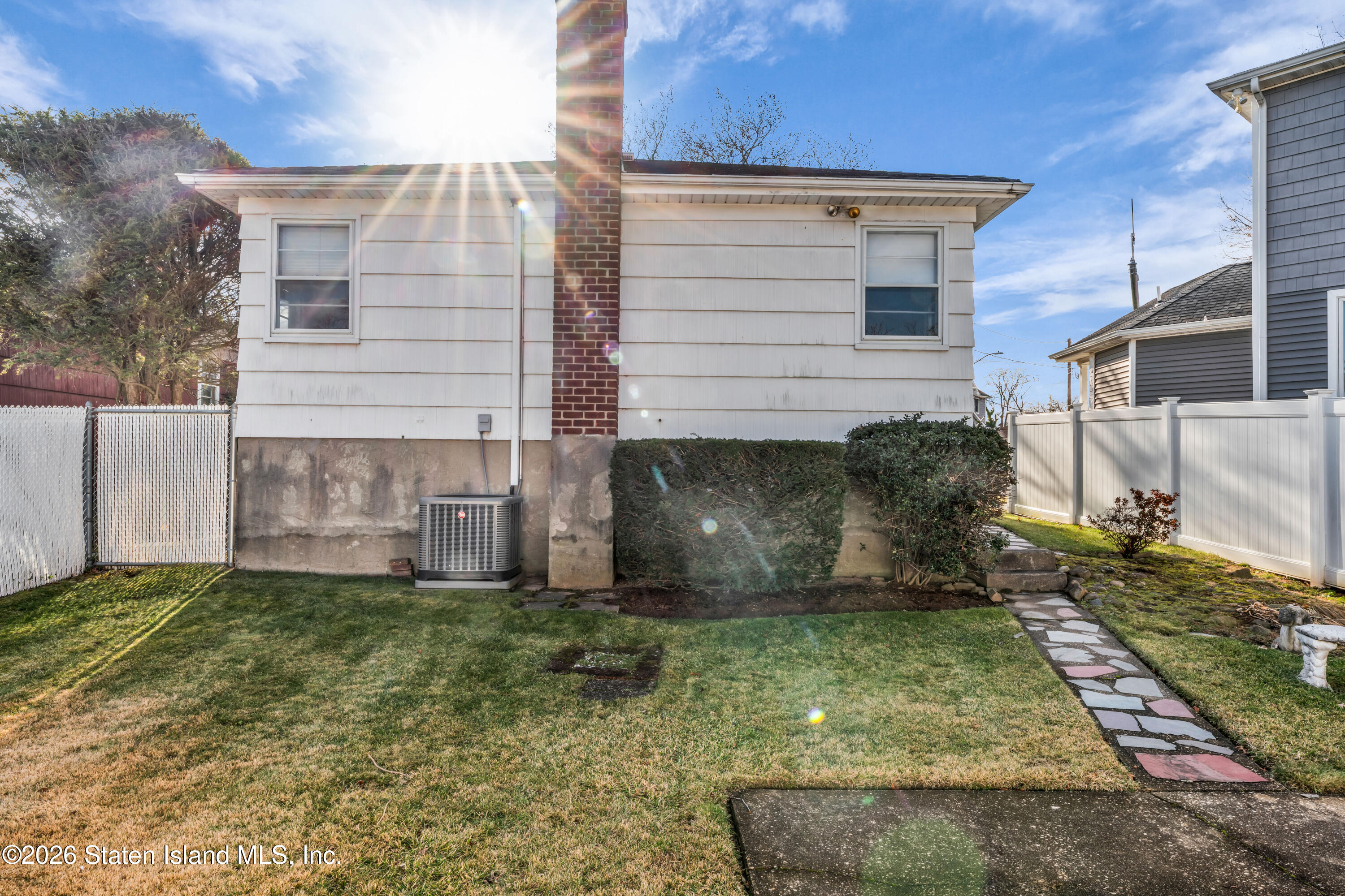 203 Wolverine Street Staten Island, NY 10306 - Photo 24 of 26 a view of a back yard of the house